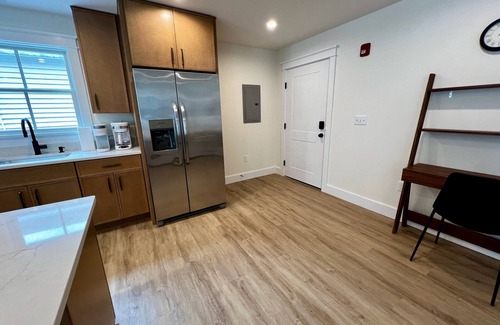 Montgomery Apartment | Luxury New 1BR 950 sq ft apartment. Sleeps 4. Stocked Kitchen, 2 Tvs, Parking.