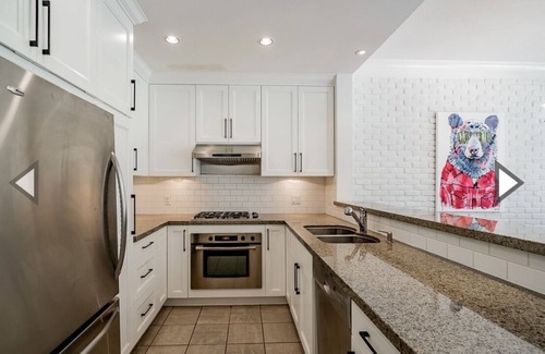West Side Condo | Luxury Pet Friendly Condo with Gym, Pool, Hottub, Steam, & Massive Outdoor Space