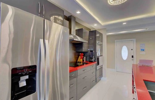 Ives Estates Villa | Luxury Retreat with Cinema, Game Table, Pool, Jacuzzi , Giant Chess, 8 Beds