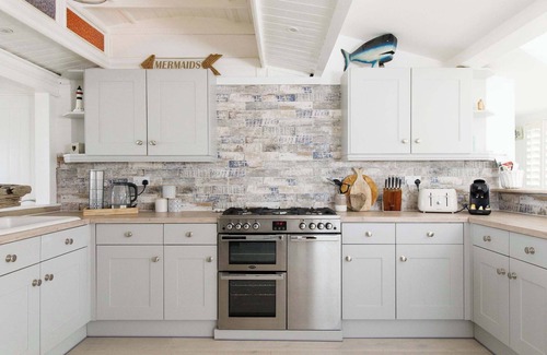 Wittering House | Luxury Seaside Retreat with Indoor Pool & Sauna