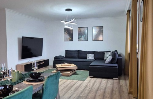 Dinslaken Apartment | Luxury suite Style and comfort TV-75 inch Large balcony Tenderingssee nearby