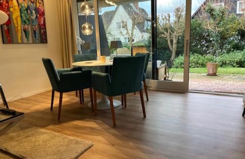 Scharbeutz Apartment | Luxus Ferienwohnung in Scharbeutz mit Garten
