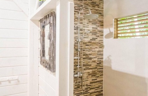Pointe-Noire RV Rental | MABOUYA Creole bungalow sleeps 2 (a clic clac sleeps an additional 2)
