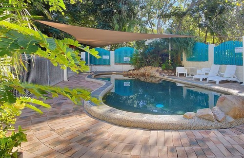Arcadia Apartment | Magnetic Reef 3 - Relaxing tropical getaway with lush gardens and complex pool, minutes to Alma Bay