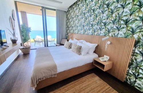 Kfardebian House | Majestic Palm: Beachfront Exotic Room in Batroun
