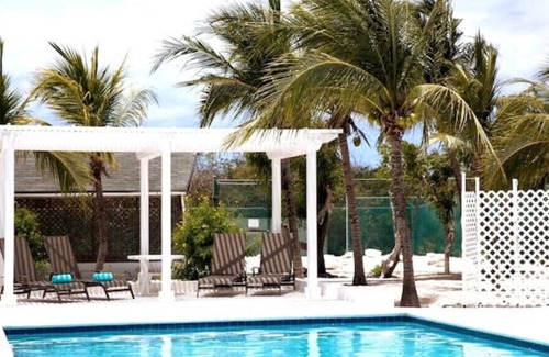 Providenciales Apartment | Manisa 2BR - Pool and Tennis. Family Friendly, Close to beach, Central and Quiet