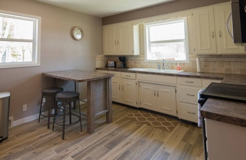 Manistee House | Manistee Channel Waterfront Home with Boat Dock