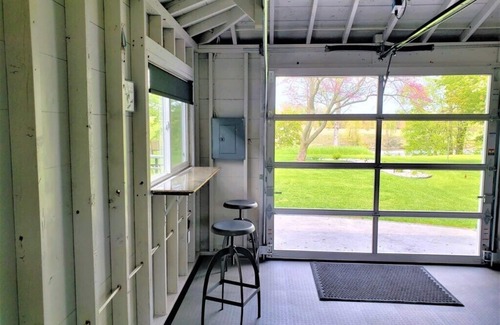 Manistee House | Manistee Channel Waterfront Home with Boat Dock