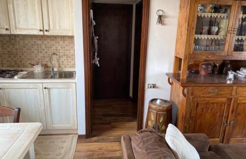 Conco Apartment | Mansarda Le Laite by Ca-Sa Check
