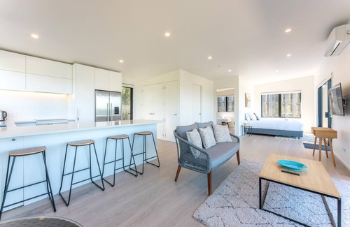Surfdale Cottage | Marama Cottages - Luna Cottage - Located in the heart of Surfdale with outstanding views over the water this brand new 2 bedroom apartment is perfect for family holidays on Waiheke – walking distance to local beaches, off street parking for up to 2 v
