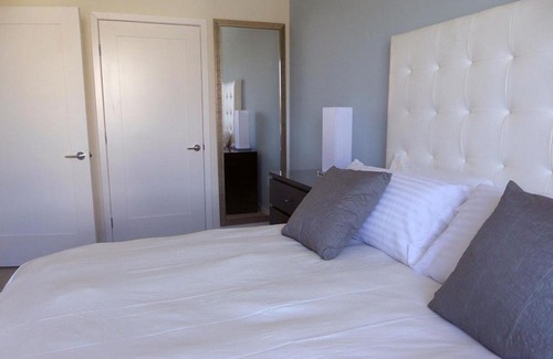 Downtown Apartment | Masterpiece 2-Bedroom with Balcony, Pool, and Spa