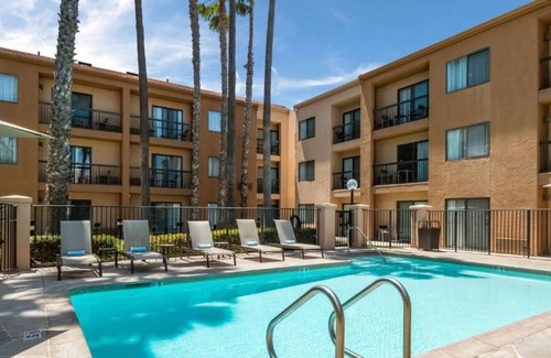 Downtown Village House | Maximum Comfort! Pet-friendly Unit, Outdoor Swimming Pool, Near Huntington Beach