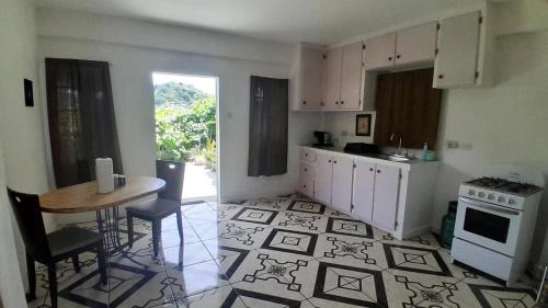 Kingstown Apartment | McKies Hill Suite #1 - Your Home Away from Home