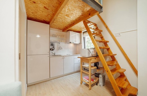Bonfim Apartment | Mezzanine Stylish Apartment Q by Vacationy