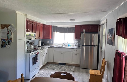 Lake Leelanau Cottage | Michele’s Landing, Charming cottage in amazing Lake Leelanau, on narrows w/dock
