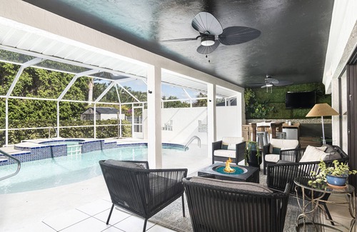 Bonita Springs House | Mid Century Home with Heated Pool + Spa