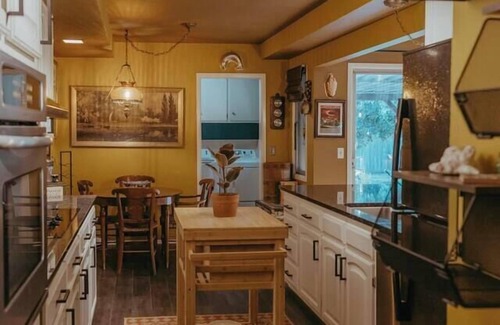 Wichita House | Mid-Century Ranch: Hot Tub & Vintage Camper