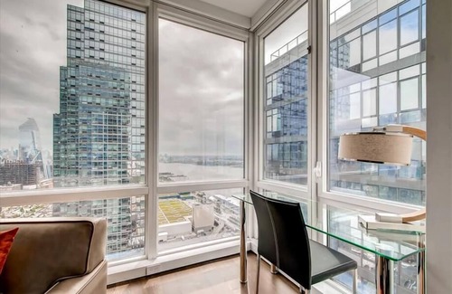 Hell's Kitchen Apartment | Midtown West 1 Deluxe BR Downtown/river views | in-unit W/D