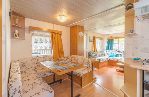 La Tremblade RV Rental | Mobile Home 'Mobilhome Mh343' with Shared Pool, Private Terrace and Private Garden