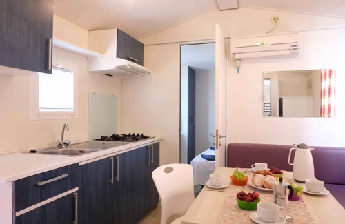 Gralaoni-Pralesi-Cisano House | Mobilehome with air conditioning, terrace and pool