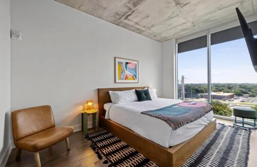 Rainey Street Historic District House | Modern 1BR Condo on Rainey St with Pool and Views