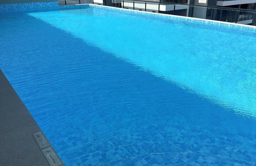 Masaki Apartment | Modern 2BR Condo with Gym & AC in Upscale Masaki