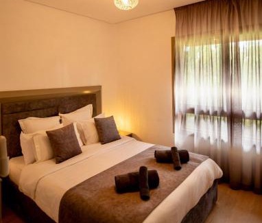Menara Apartment | Modern 3BR Apartment with Pool & Golf Views