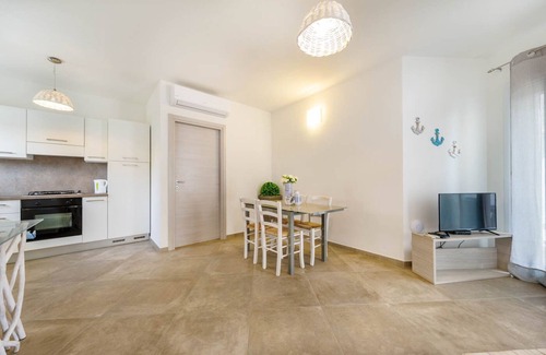 Monte Petrosu Apartment | modern apartment 5 min. from the sea with swimming pool, air conditioning and wi-fi