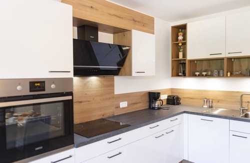 Schwoich Apartment | Modern attic apartment on a farm