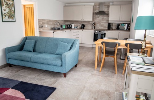 Margam Cottage | Modern Contemporary Cottage with Riverside Terrace and free WiFi