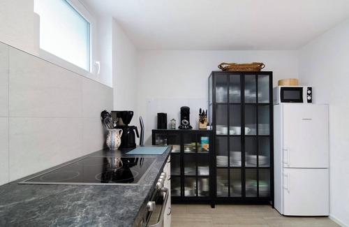Meersburg Apartment | Modern Holiday Apartment "Gartenterrasse" with Garden Terrace and Wi-Fi
