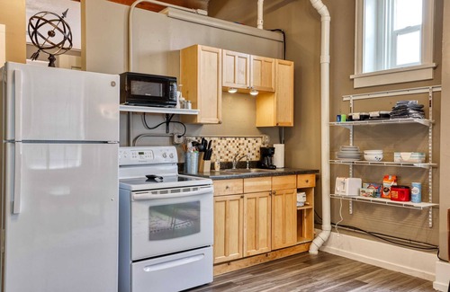 Sheridan Apartment | Modern Industrial Western Suite, Directly Downtown