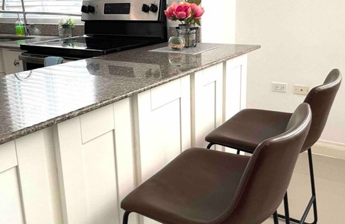 Runaway Bay Apartment | Modern Luxury 1BR Condo in Kingston