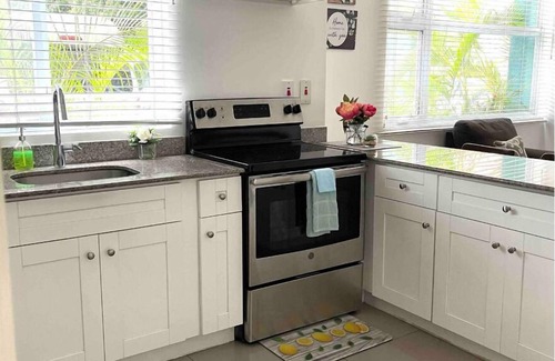 Runaway Bay Apartment | Modern Luxury 1BR Condo in Kingston