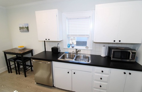 Tulsa House | Modern Midtown Home -Dogs OK -Work Desks -Porch Swing -Fully Privacy Fenced Yard