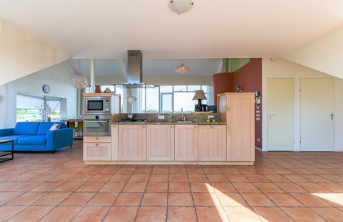Municipality of Uitgeest Apartment | Modern penthouse with stunning lake views