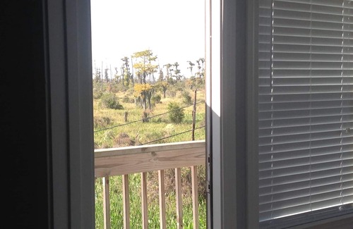 Akers House | Modern River Camp Located in Akers,LA next to the Famous Sun Buns Bar and Grill