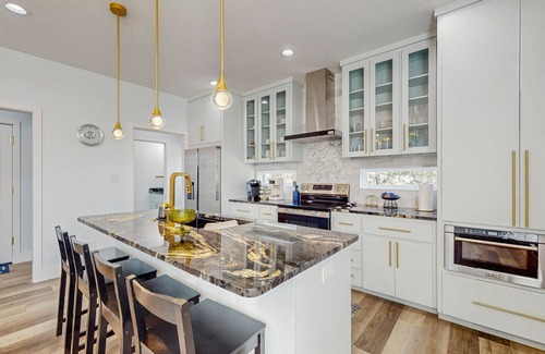 Granite Shoals House | Modern two-story home with kitchen, backyard, patio & dog-friendly