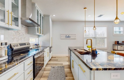 Granite Shoals House | Modern two-story home with kitchen, backyard, patio & dog-friendly