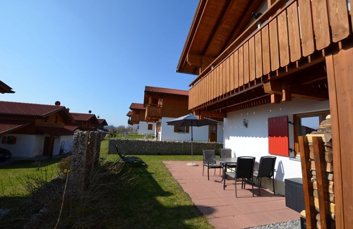 Lechbruck House | Modern vacation home by the lake in the Via Claudia vacation village with balcony and fireplace