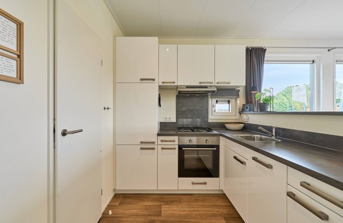 Suesel House | Modern vacation home Sunshine am See in Seeparx Süsel with terrace and WLAN