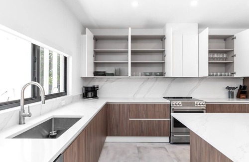 Ojus House | Modern Waterfront Paradise with Heated Pool - Near the Beach & Aventura Mall!