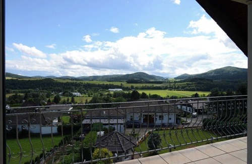 Dodenau Apartment | Modern, well-maintained apartment with fantastic panoramic views and balcony