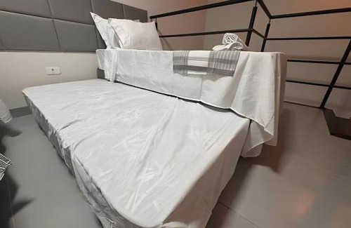 Jacarezinho Villa | Moderno Loft com ar condicionado e vaga