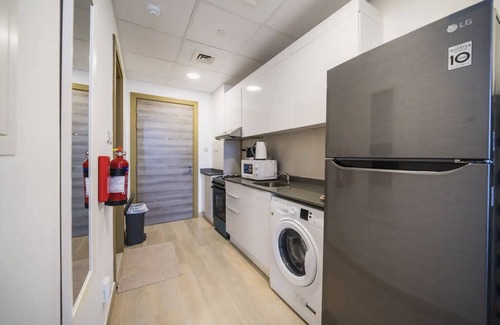 Emirates Hills Apartment | Morpheus Stays - Bali Vibes Studio in JVC
