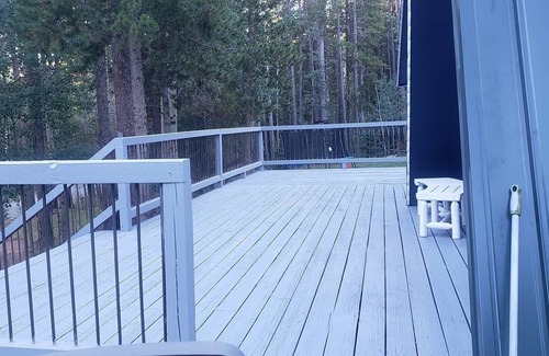Evergreen Cabin | Mountain Bliss is a quiet mountain retreat, sleeps 7, hot tub, pet friendly