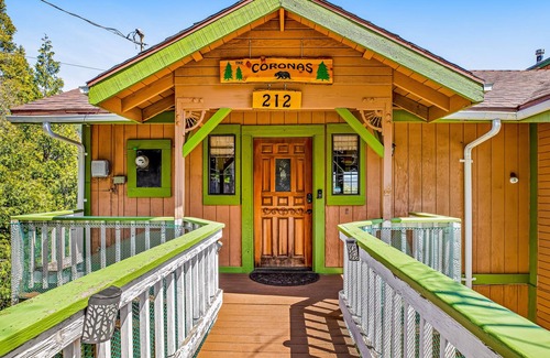 Cedarpines Park House | Mountain-view cabin with deck, gas grill, fireplace, foosball, & washer/dryer