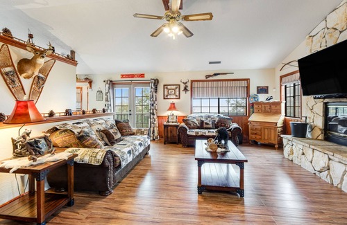 Cedarpines Park House | Mountain-view cabin with deck, gas grill, fireplace, foosball, & washer/dryer