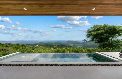 Rio Seco House | Mountainside Home with Modern Design Sweeping Ocean Views & Private Swimming Pool