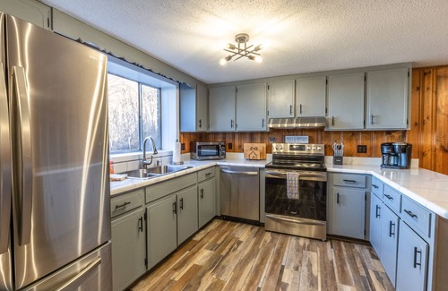 Sylva House | Mountainside house with long range views, pool table, firepit, & W/D